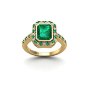 Gold emerald emerald halo ring front view
