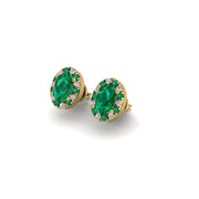 Gold emerald oval halo stud earrings