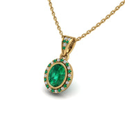 Gold emerald oval heavenly halo pendant