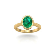 Gold emerald oval solitaire ring front view