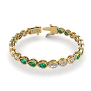 Gold emerald pear stellar tennis bracelet