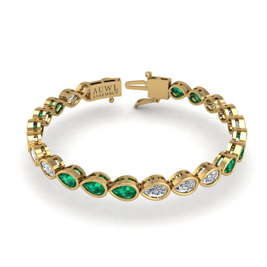 Gold emerald pear stellar tennis bracelet
