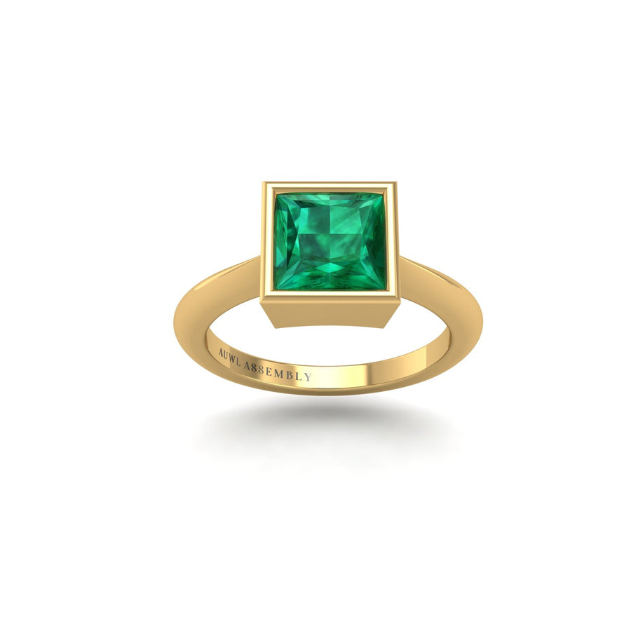 Gold emerald princess solitaire ring front view