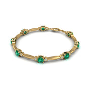 Gold emerald round stardust designer bracelet