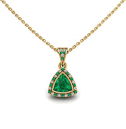 Gold emerald trillion heavenly halo pendant center view