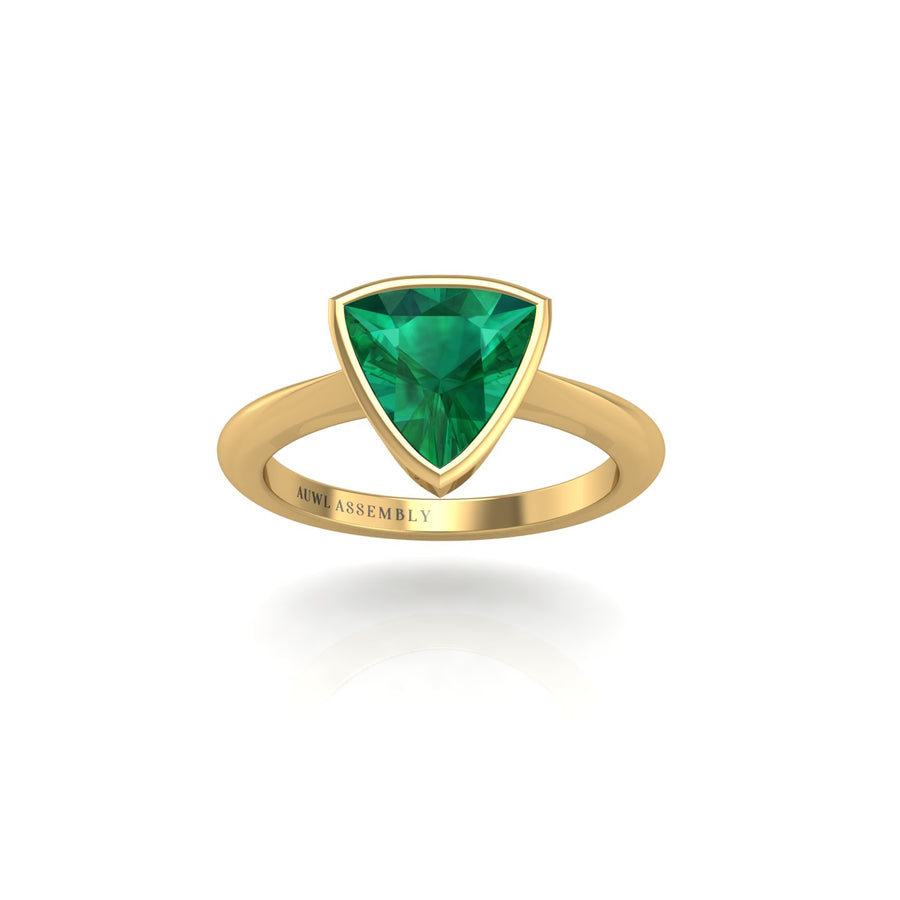 Gold emerald trillion solitaire ring front view