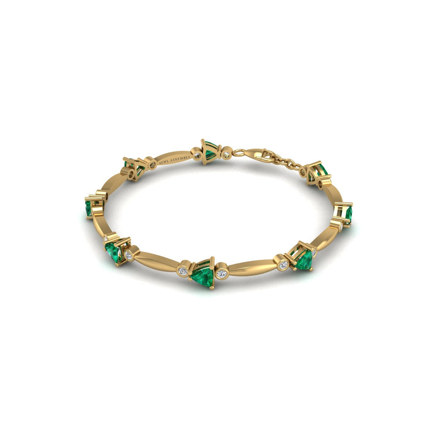 Gold emerald trillion stardust designer bracelet