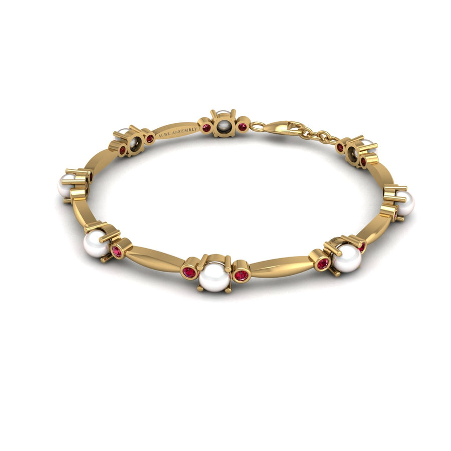 Gold pearl ruby stardust designer bracelet