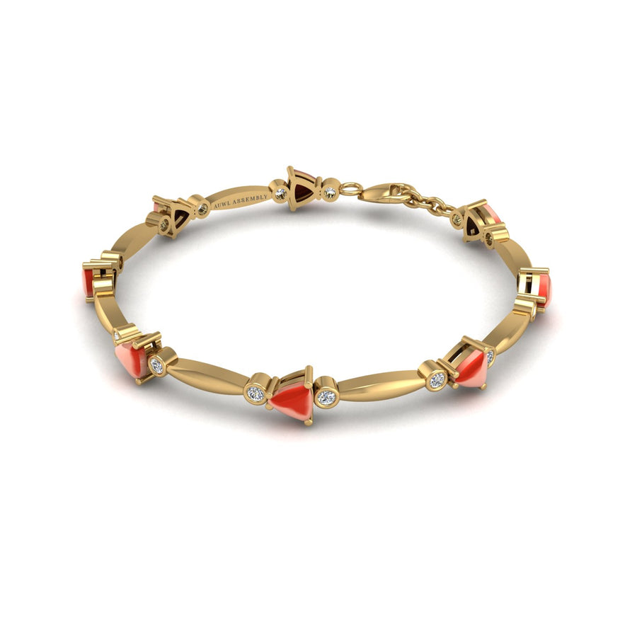 Gold red coral stardust designer bracelet