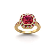 Gold ruby cushion halo ring front view
