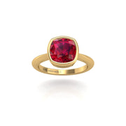 Gold ruby cushion solitaire ring front view