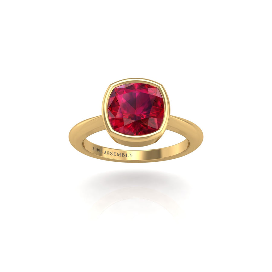 Gold ruby cushion solitaire ring front view