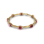 Gold ruby cushion stardust designer bracelet