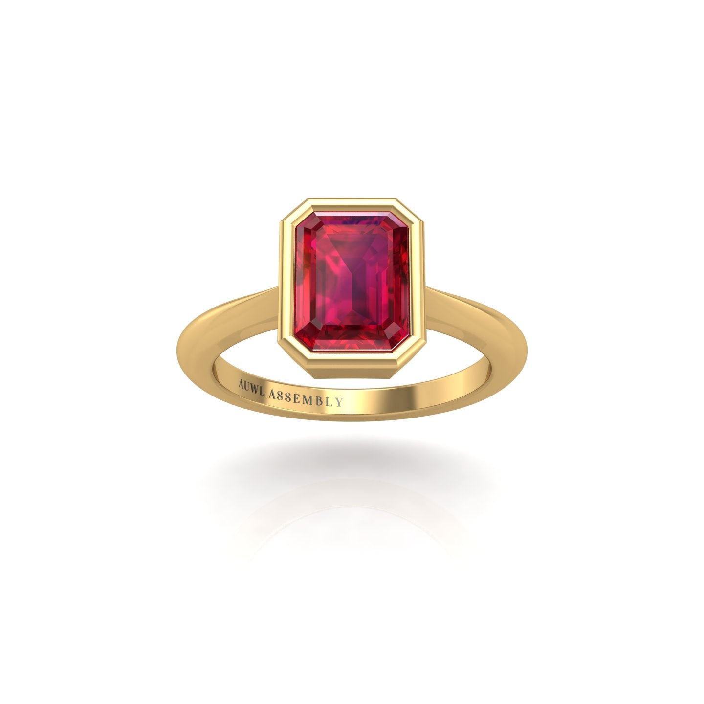 Gold ruby emerald solitaire ring front view