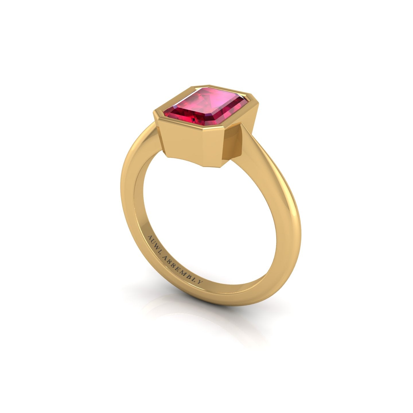 Gold ruby emerald solitaire ring