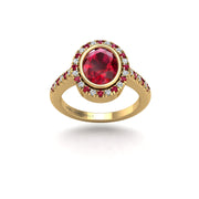 Gold ruby oval halo ring front view