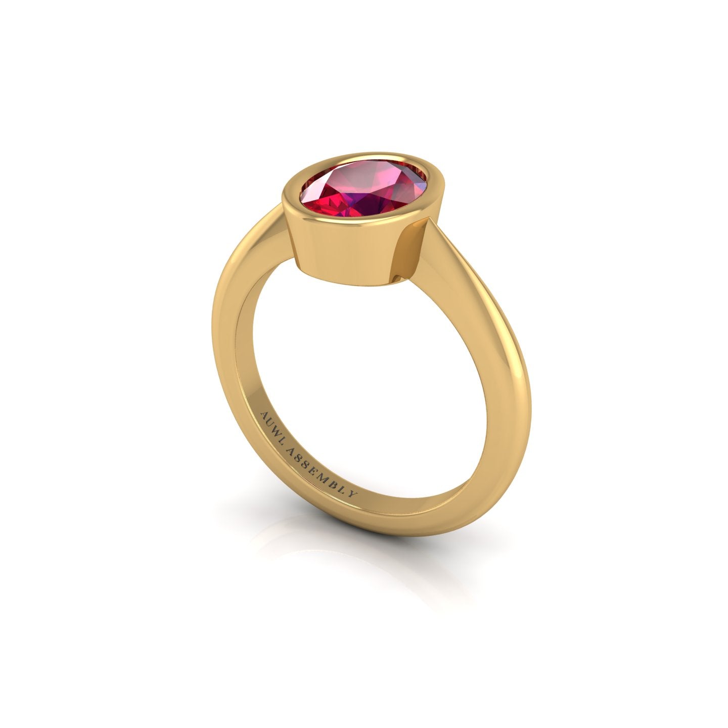 Gold ruby oval solitaire ring