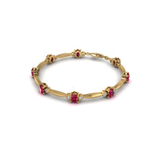 Gold ruby oval stardust designer bracelet