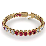 Gold ruby oval stellar tennis bracelet