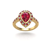 Gold ruby pear halo ring front view