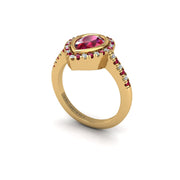 Gold ruby pear halo ring