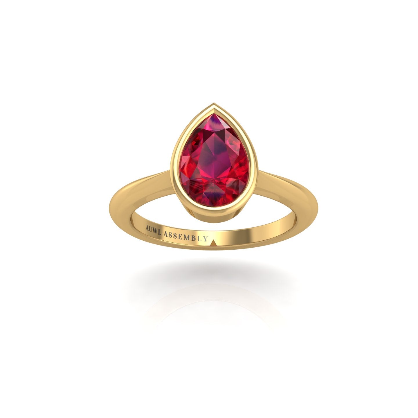 Gold ruby pear solitaire ring front view
