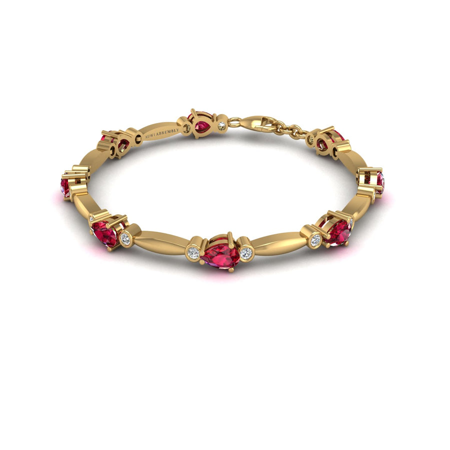 Gold ruby pear stardust designer bracelet