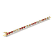 Gold ruby pear stellar tennis bracelet open view