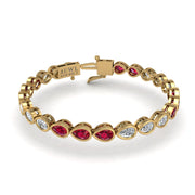Gold ruby pear stellar tennis bracelet