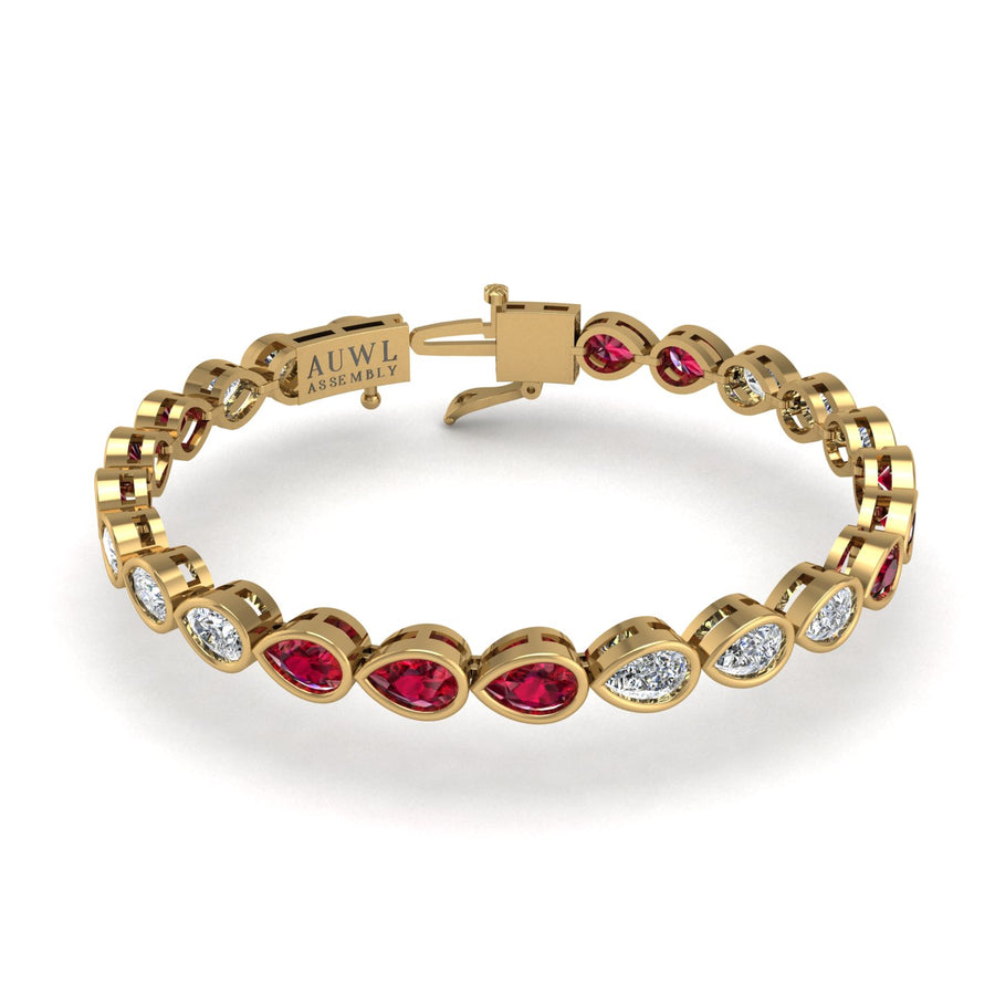 Gold ruby pear stellar tennis bracelet