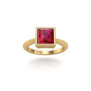 Gold ruby princess solitaire ring front view