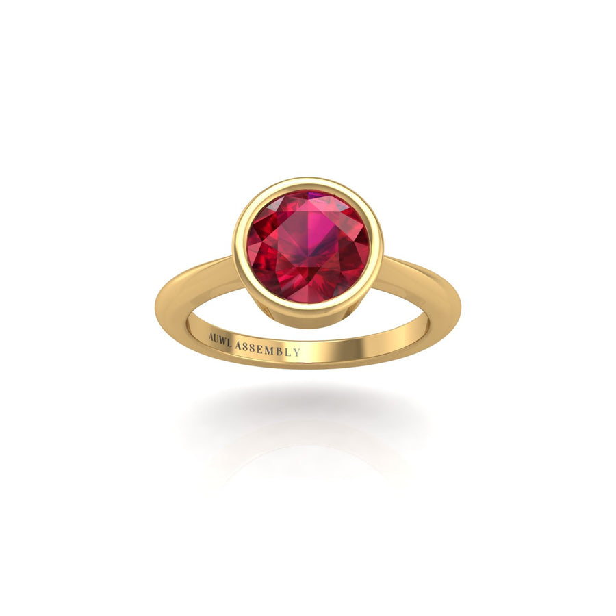 Gold ruby round solitaire ring front view