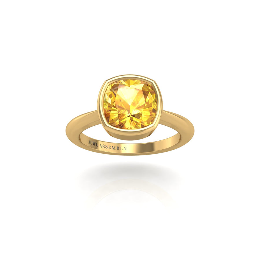 Gold yellow sapphire cushion solitaire ring front view