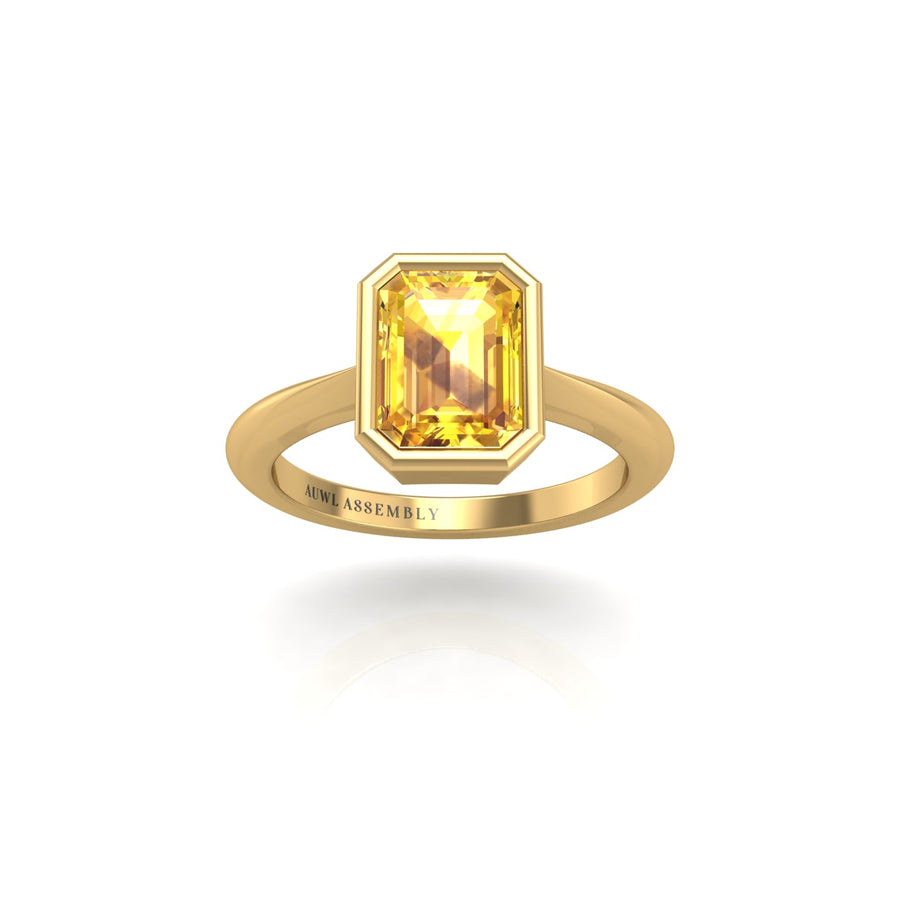 Gold yellow sapphire emerald solitaire ring front view