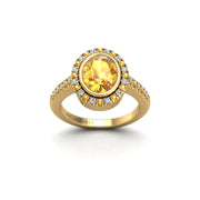 Gold yellow sapphire oval halo ring front view