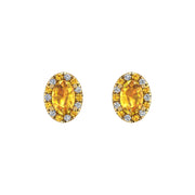 Gold yellow sapphire oval halo stud earrings front view