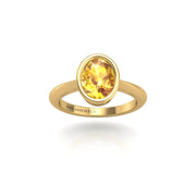 Gold yellow sapphire oval solitaire ring front view