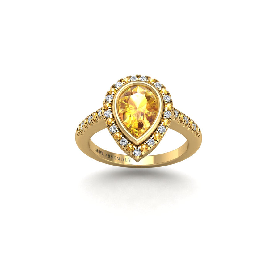 Gold yellow sapphire pear halo ring front view
