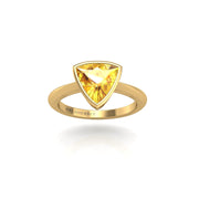 Gold yellow sapphire trillion solitaire ring front view