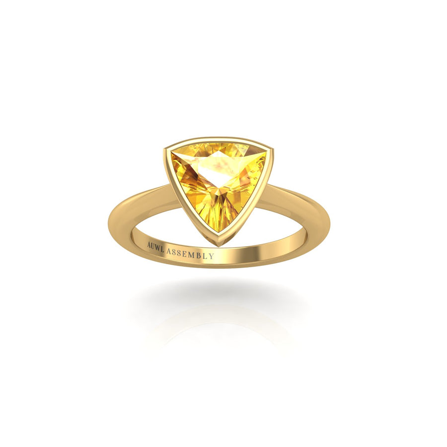 Gold yellow sapphire trillion solitaire ring front view
