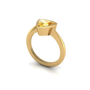 Gold yellow sapphire trillion solitaire ring